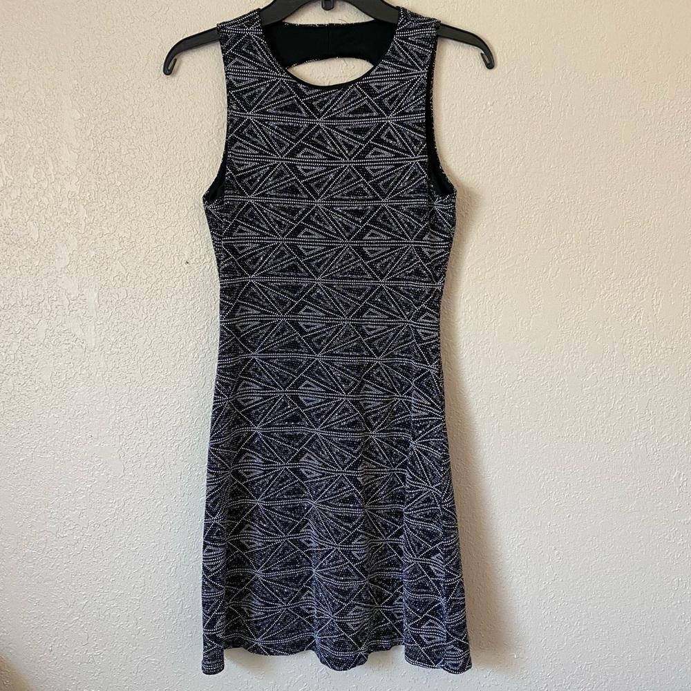 Black, silver, and white sparkly dress.